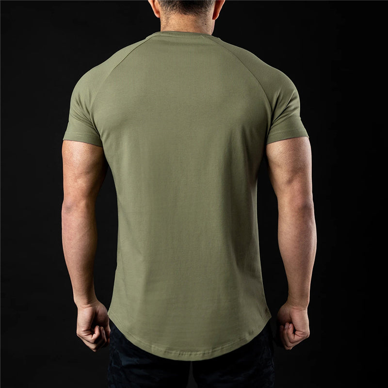 Playera de manga corta de color liso para fitness para hombre