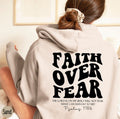 Sudadera cristiana "Fe sobre el miedo" con versículo bíblico