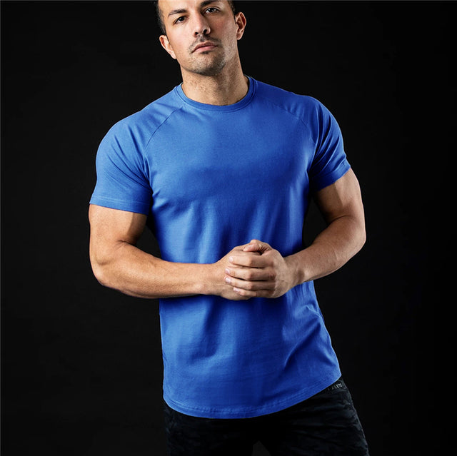 Playera de manga corta de color liso para fitness para hombre