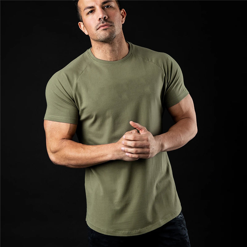 Playera de manga corta de color liso para fitness para hombre