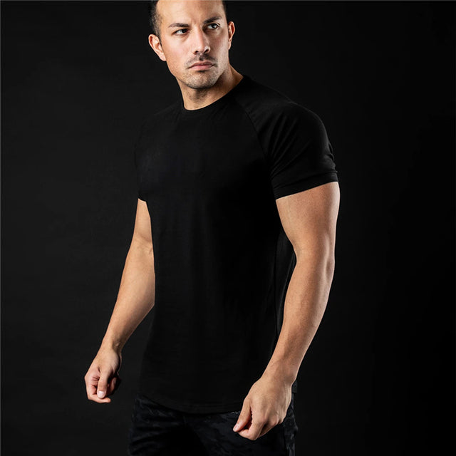 Playera de manga corta de color liso para fitness para hombre